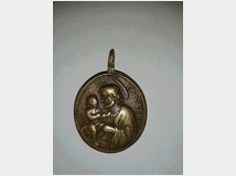 Antica medaglia devozionale in bronzo